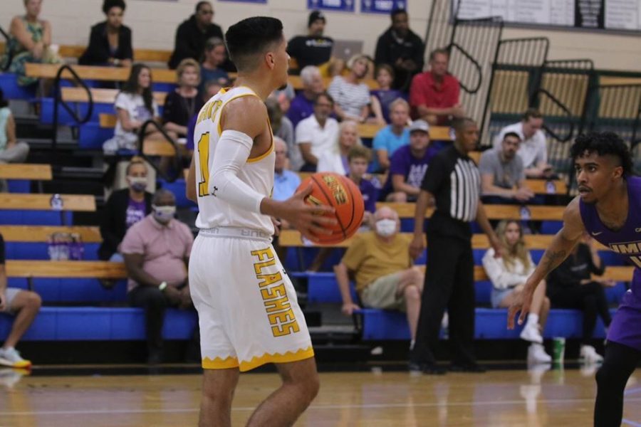 Redshirt sophomore guard Giovanni Santiago plays during the Naples Invitational against James Madison on Monday, Nov. 22 in Naples, Florida. 