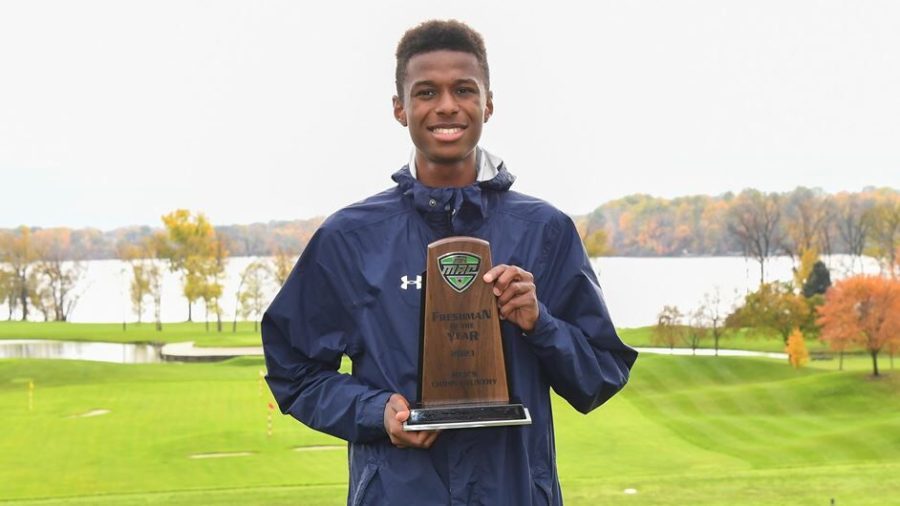 Baidy+Ba+hold+his+MAC+Freshman+of+the+Year+trophy+after+finishing+as+the+highest+first-year+runner+during+the+MAC+Championships+on+Saturday+Oct.+30+in+Ypsilanti%2C+Michigan.%C2%A0