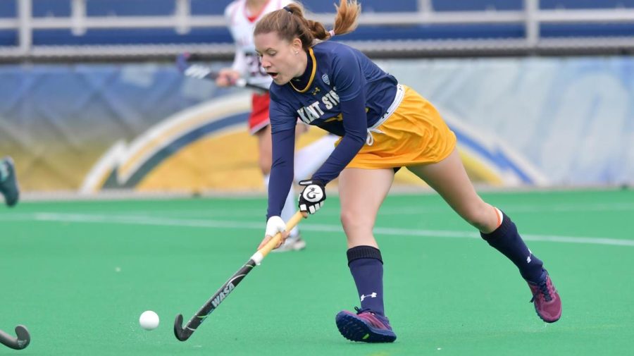 Senior forward Luisa Knapp moves the ball during a Kent State field hockey match.