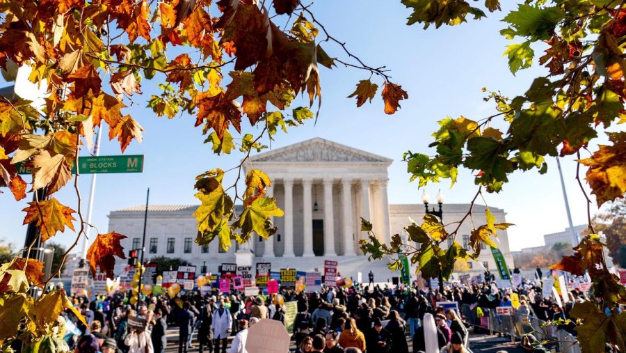 Abortion+rights+advocates+and+anti-abortion+protesters+demonstrate+in+front+of+the+U.S.+Supreme+Court%2C+Wednesday%2C+Dec.+1%2C+2021%2C+in+Washington%2C+as+the+court+hears+arguments+in+a+case+from+Mississippi%2C+where+a+2018+law+would+ban+abortions+after+15+weeks+of+pregnancy%2C+well+before+viability.%C2%A0