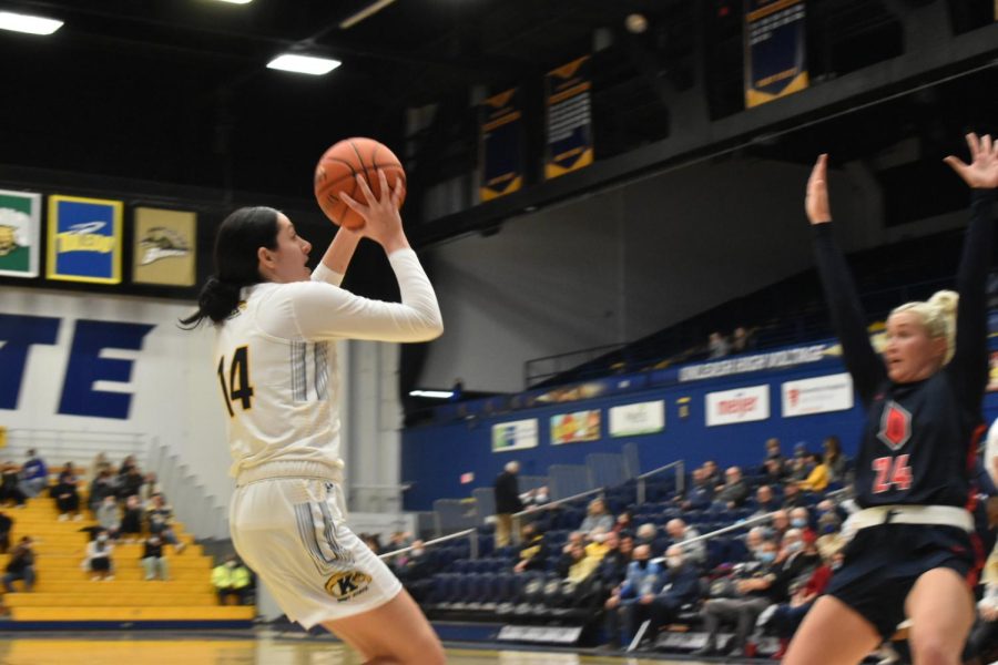 Katie Shumate, junior, shoots a basket in todays game against Duquesne. The Golden Flashes Womens Basketball team won, 71-66 on Wed. Dec. 8, 2021.