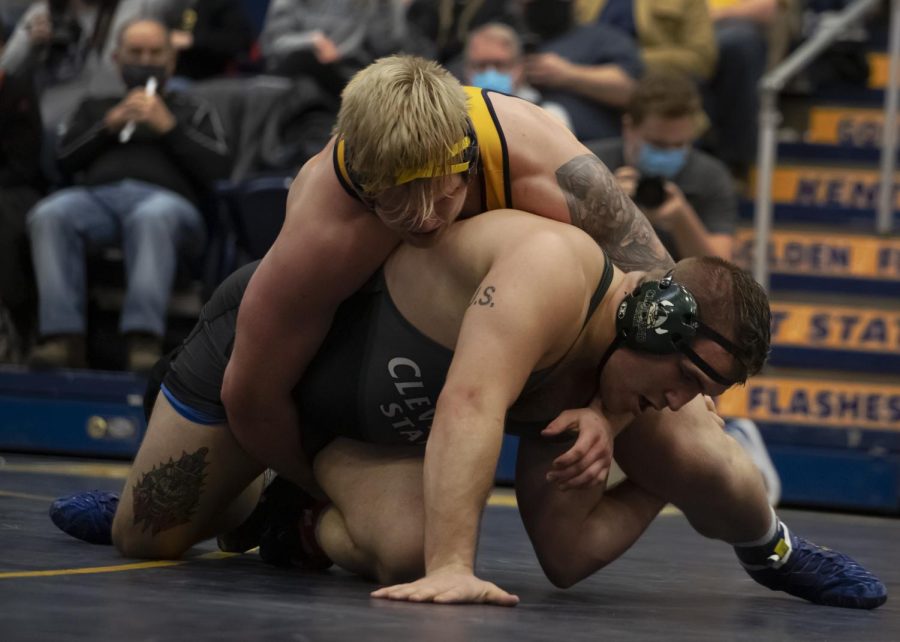 Redshirt+junior+Jacob+Cover+attempts+to+pin+a+Cleveland+State+University+wrestler+during+the+wrestling+meet+on+Jan.+27%2C+2022.+Cover+scored+a+3+points+against+his+opponent+which+lead+Kent+to+beat+Cleveland+State+27-9.