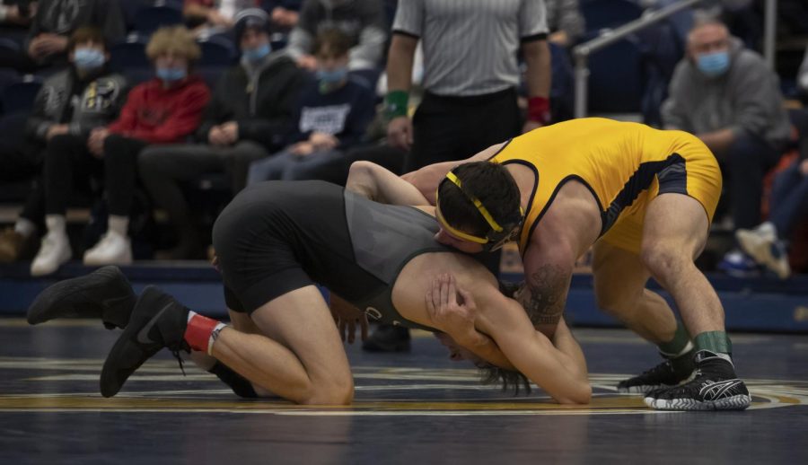 Redshirt+junior+Brendon+Fenton+wrestles+a+Cleveland+State+University+wrestler+during+the+meet+on+Jan.+27%2C+2022+in+Kent%2C+OH.+Kent+State+beat+Cleveland+State+25-7.