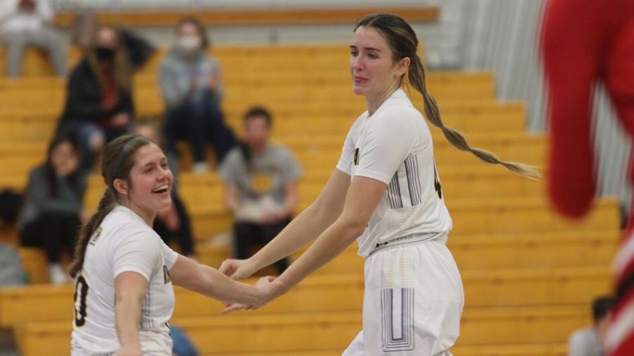 Senior forward Lindsey Thall and sophomore guard Casey Santoro celebrate during the Kent State womens basketball game against Miami at Kent Feb. 7. 
