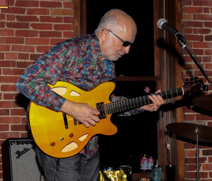 Tom, the band leader of Gaetanos, said they have spent six years of BeatleFests playing at Rays Place in downtown Kent. His band is committed to a blues style and says the Beatles are the most magical rock group of all time.