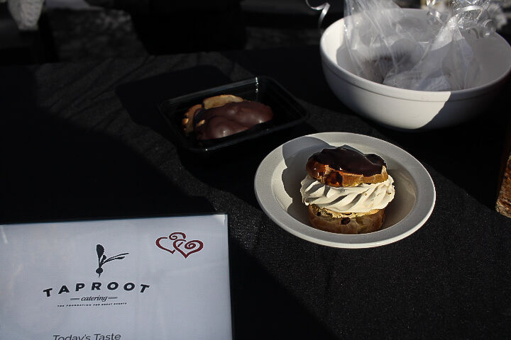 Taproot, a catering company co-owned and managed by Linda Fiala and husband, J Michael Fiala took advantage of the Chocolate Walk to promote some of their tasty chocolate confessions like their chocolate mousse.