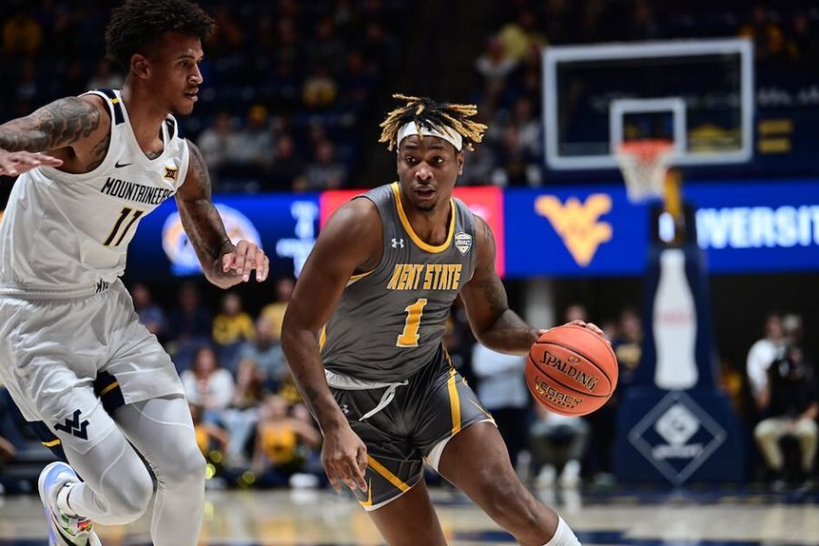 Redshirt freshman VonCameron Davis dribbles the ball during the Kent State mens basketball loss to West Virginia in Morgantown, West Virginia on Sunday, Dec. 12.
