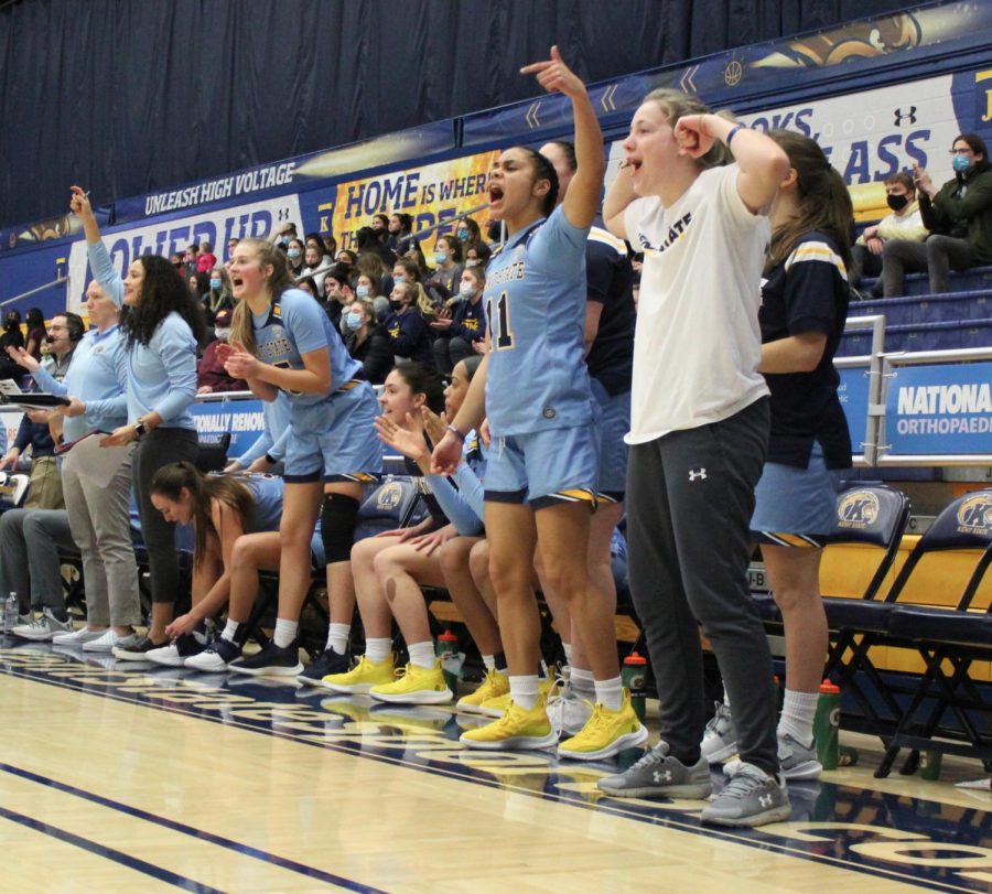 Team cheers on the sidelines as Kent scores again on Wed. Feb. 2, 2022 against Central Michigan University. The final score was 68-57 Kent.  