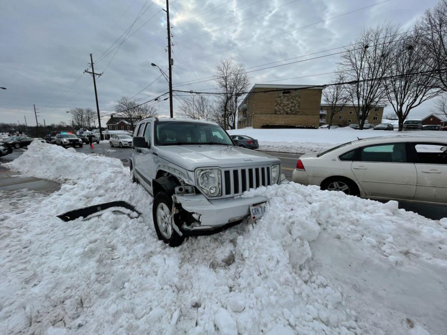 A car sits in a snow bank after being involved in an accident on East Main Street on Jan. 19, 2022.