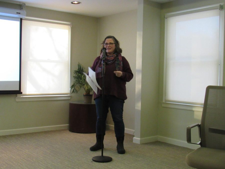 Cassandra Pegg-Kirby, director of the Womens Center, speaks at the Speaker on the Path: The Words and the Works of Bell Hooks event at the Williamson house on Tuesday, Jan. 25, 2022.
