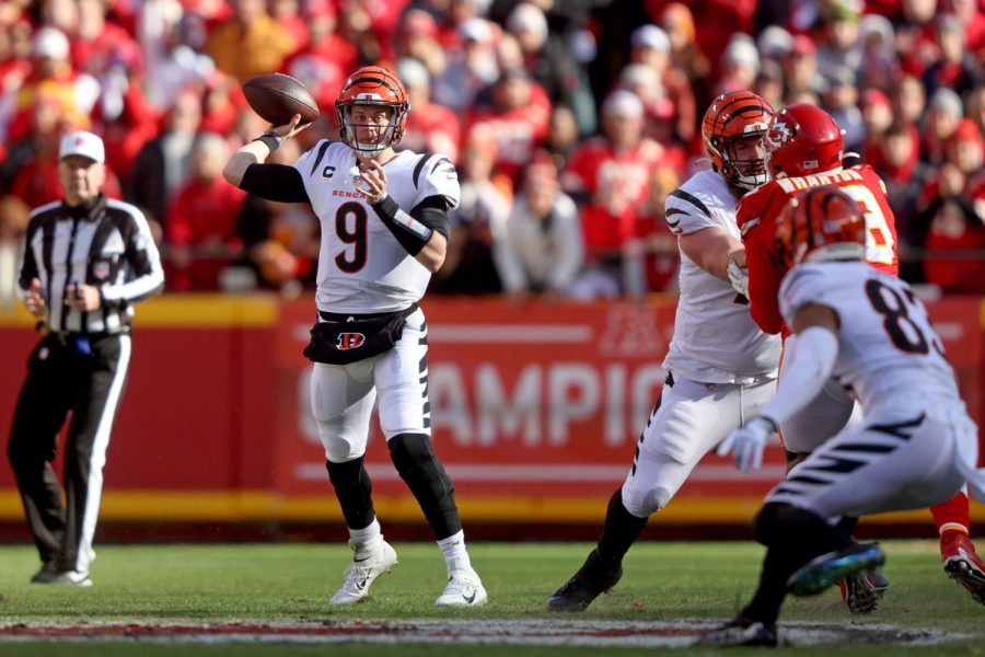 KANSAS CITY, MISSOURI - JANUARY 30: Quarterback Joe Burrow #9 of the Cincinnati Bengals throws a first quarter pass against the Kansas City Chiefs in the AFC Championship Game at Arrowhead Stadium on January 30, 2022 in Kansas City, Missouri. (Photo by Jamie Squire/Getty Images)