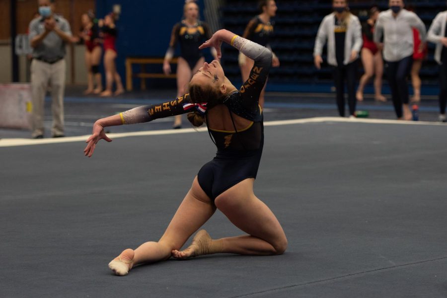 Cheyenne Pretola ends her floor routine with flourish during the gymnastics meet against Rutgers and Cornell University on Jan. 28, 2022.