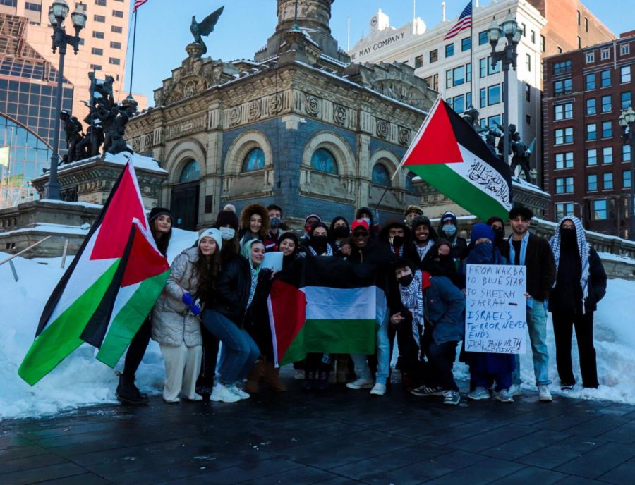 At the end of the protest for justice for Palestine, the protesters posed in front of the Soldiers and Sailors monument holding up their Palestinian flags on Saturday, Jan. 29. Students, including ones from Kent State, stood in below freezing weather for almost two hours to support Palestine and fight the oppression of Palestinian people. 