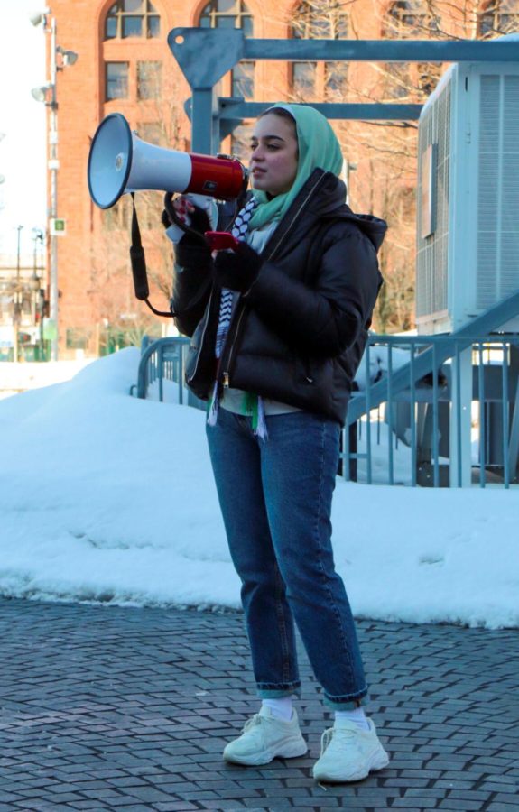 Gia, a student from John Carroll University, gives a powerful speech in favor of fighting systems of institutionalized discrimination and fighting for freedom of Palestine at a protest in Cleveland public square on Saturday, Jan. 29.