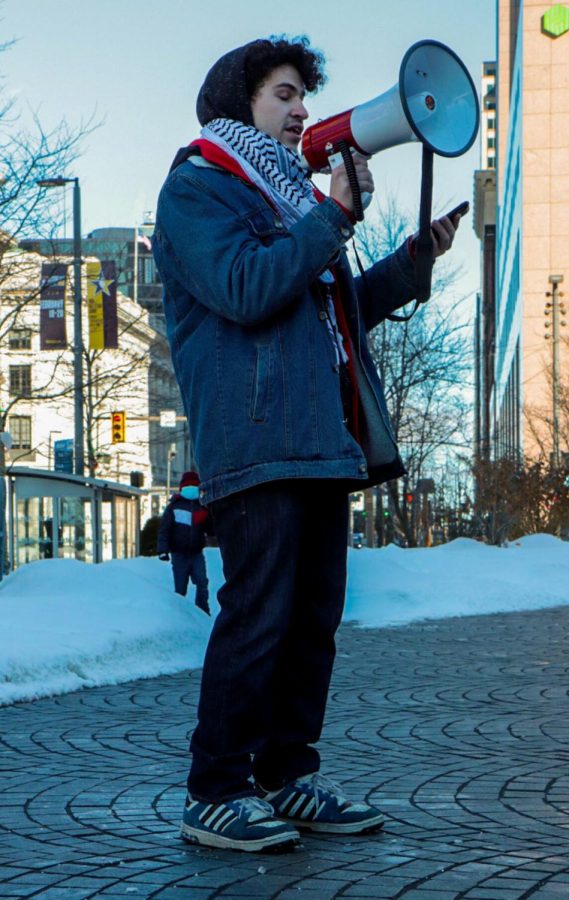 Sam Bachelor, a student advocating for justice for Palestine, gave a passionate speech at the protest in Cleveland public square on Saturday, Jan. 29. In his speech, he said, “[They] have nukes and we have stones and that’s the beauty of it.”