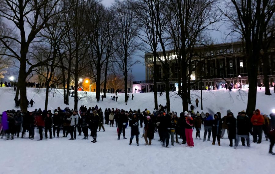 Kent State students formed teams and pelted each other with snowballs at a snow ball fight in front of Taylor Hall on Monday, January 17.