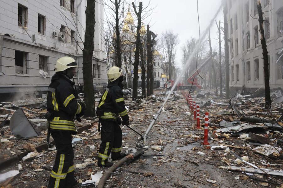 Firefighters extinguish a building of Ukrainian Security Service (SBU) after a rocket attack in Kharkiv, Ukraines second-largest city, Ukraine, Wednesday, March 2, 2022. Russias assault on Kharkiv, Ukraines second largest city, continued Wednesday, with a Russian strike hitting the regional police and intelligence headquarters, according to the Ukrainian state emergency service. (AP Photo/Andrew Marienko)