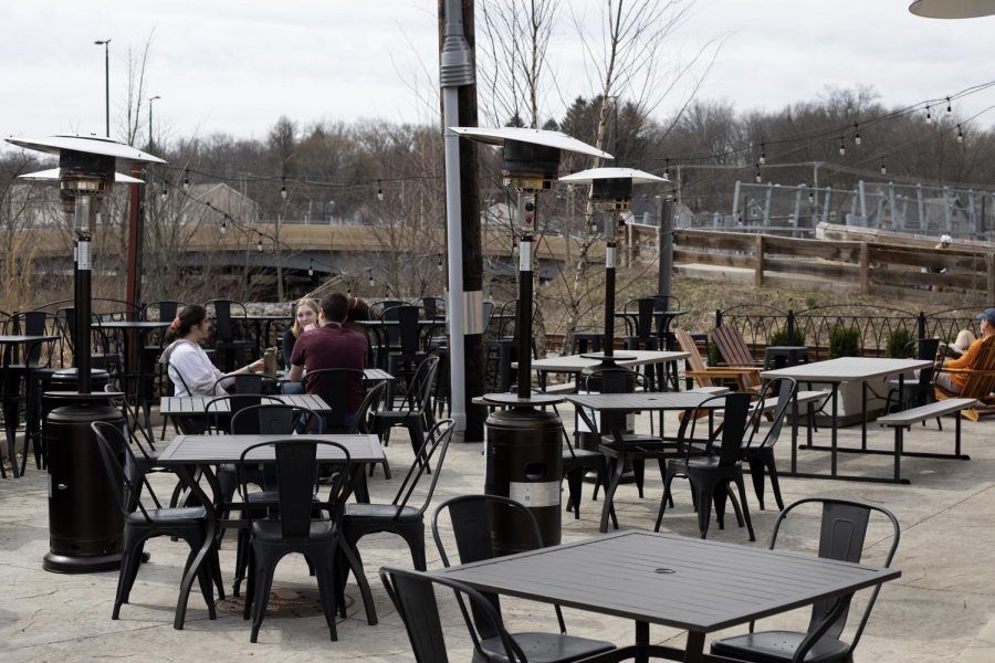 Customers of North Water Brewing sit outside on the patio and enjoy the nice day. North Water Brewing is located at 101 Crain Ave in Kent, Ohio.
