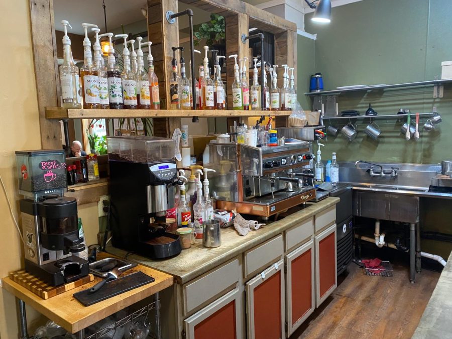 Behind the counter of Scribbles Coffee Co.