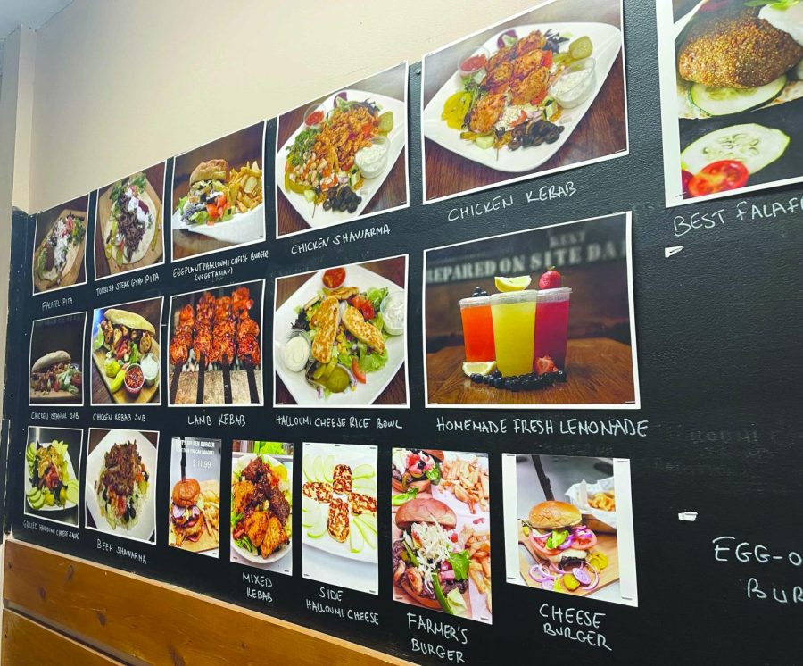 A menu is featured on the wall when walking into Troy Grille at 118 E Main St. Troy Grille is known for their Mediterranean food and homemade lemonades.