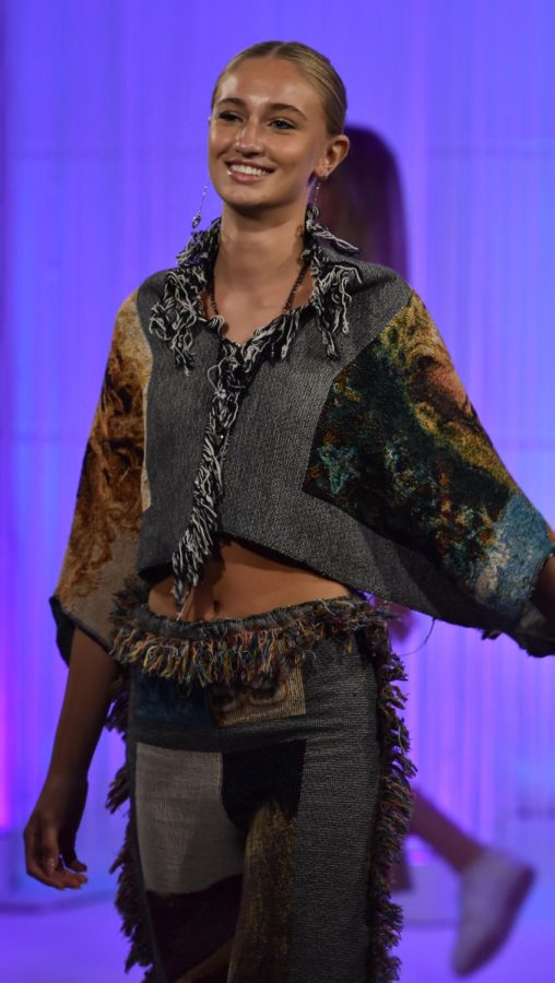A Kent State student models during the annual fashion show on April 28, 2022.