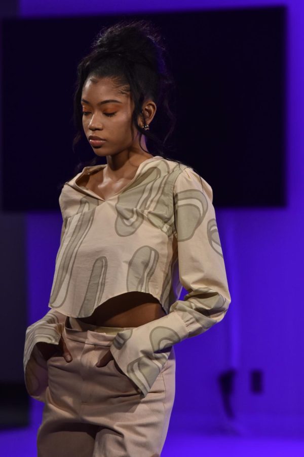 A Kent State student models Lexi Malick during the annual Kent State Fashion Show on April 28, 2022.