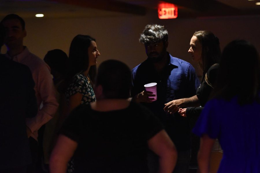 Kent State students mingle during the Latin Prom on April 22, 2022.