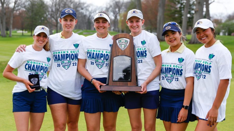 Members of the Kent State women's golf team pose with their trophy after winning the MAC Championship in Holland, Ohio on Sunday, April 24