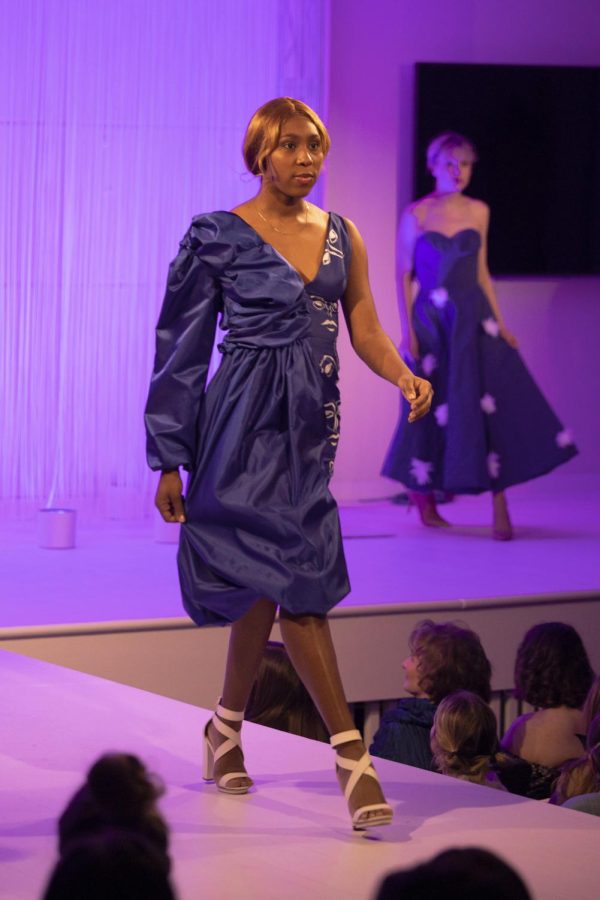 Mikeyla Parker models during the annual fashion show on April 28, 2022.