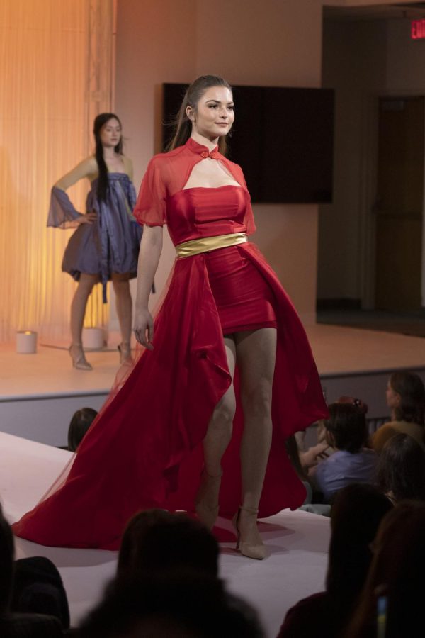 A Kent State student models Jiani Hus collection during the annual fashion show on April 28, 2022.