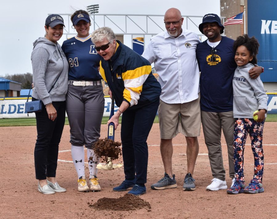 Kent State alumni Judy Devine breaks the ground to commemorate the upcoming construction of the Devine Diamond on April 30, 2022.