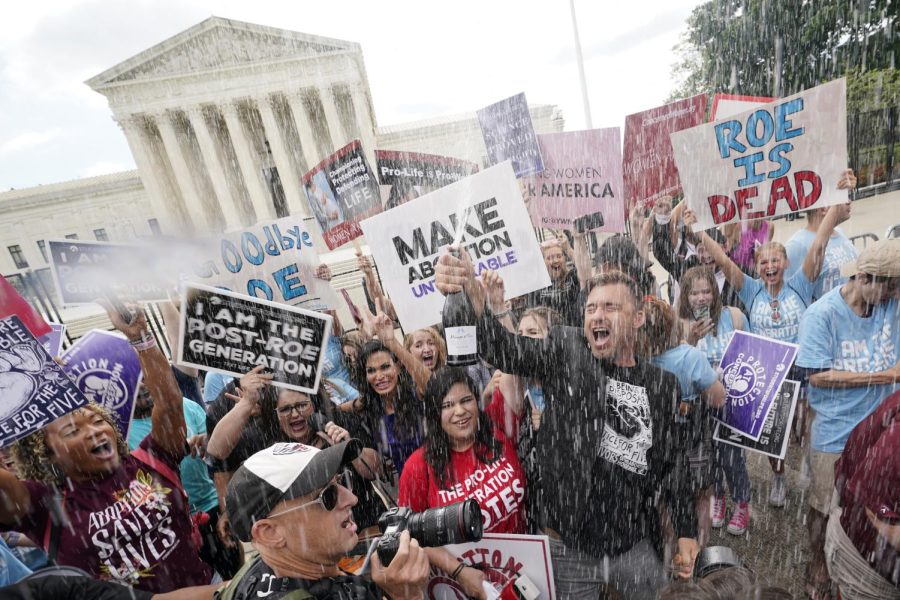A+celebration+outside+the+Supreme+Court%2C+Friday%2C+June+24%2C+2022%2C+in+Washington.+The+Supreme+Court+has+ended+constitutional+protections+for+abortion+that+had+been+in+place+nearly+50+years+%E2%80%94+a+decision+by+its+conservative+majority+to+overturn+the+courts+landmark+abortion+cases.+