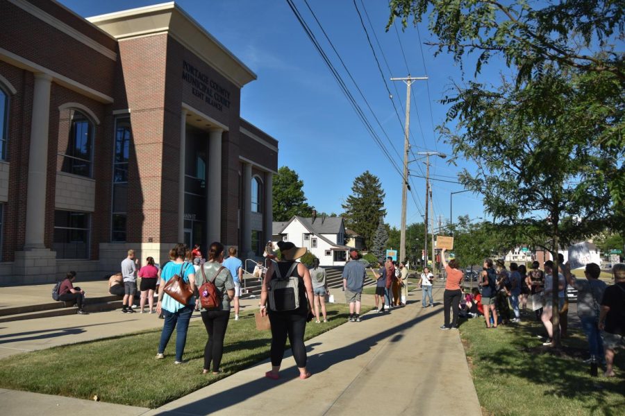 Around 50 people gather in front of the Kent Municipal Courthouse on June 24 to protest the Roe v. Wade decision hosted by SDS. 