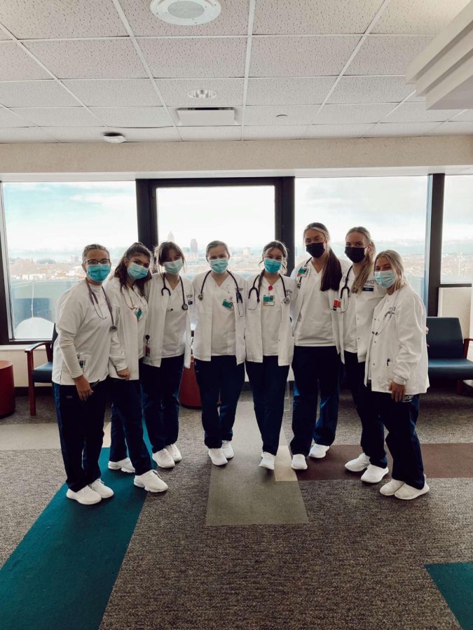 A group of nursing students at their clinicals. (from left to right) Hannah Schweier, Reese McCrann, Hannah Stark, Alex Harris, Leah Krajewski, Emily Lippe, Chloe Sickman, Nicole Cannon