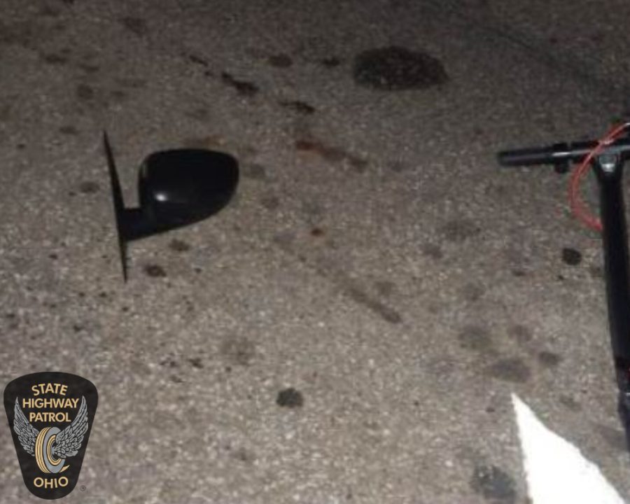 A photo from the scene of a fatal crash that killed Kent State student Colin Pho on Summit Street near Dix Stadium. It shows a broken car mirror and part of the scooter Pho was riding when he was struck from behind August 22 around 9 p.m.