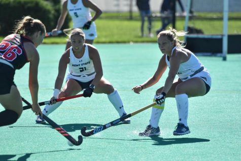 Kent State sophomore Bella Carpenter (left) and senior Sydney Washburn (right) cut their Ball State opponent off from the goal.