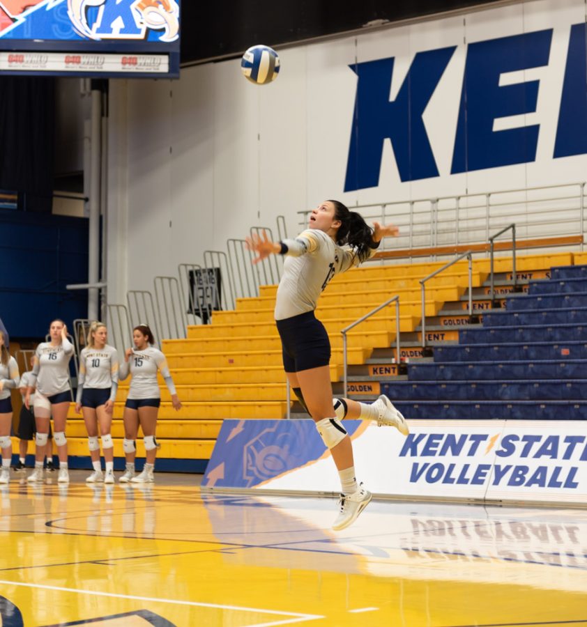 Kent State Womens Volleyball player Erin Gardner serves the ball onto the other side of the court. The team played a Saturday morning game against Cornell University.