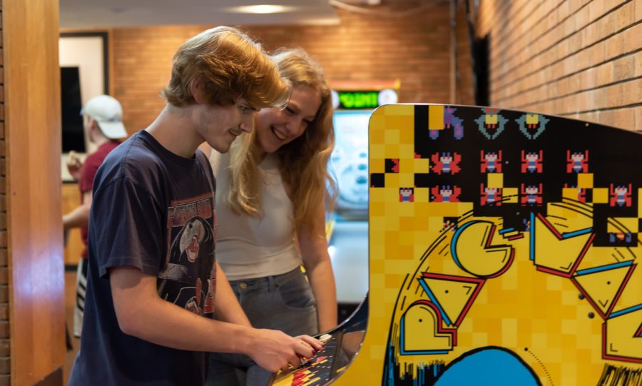 Joseph Hefler (left) and Jordan Zdych play Pac-Man on the arcade machine. This is actually my first time coming to this area, Zdych said.