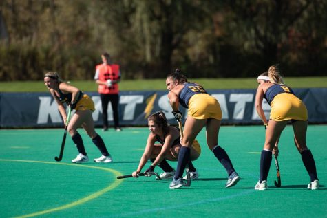 The Kent State field hockey team lines up in anticipation of a penalty corner.