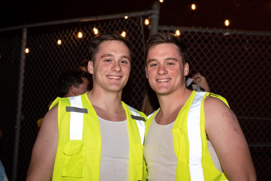 Brothers Evan and Gary Kurr dress up as construction workers outside of Brewhouse Pub.