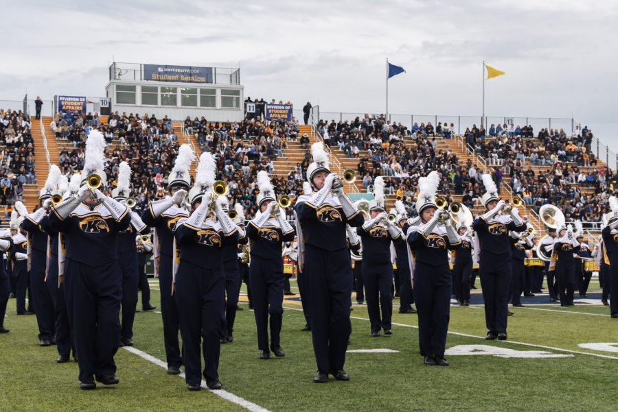 The Kent State Marching Golden Flashes play during halftime for the crowd. The band played a variety of Harry Styles songs including What Makes You Beautiful and Watermelon Sugar.