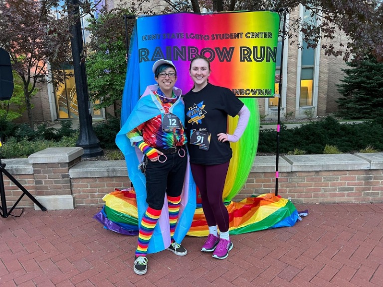 (From left to right) Students Zee Ringler (He/They) and Sienna Jepsen (She/Her) show their pride and prepare to race in last year’s “Rainbow Run” 5k.