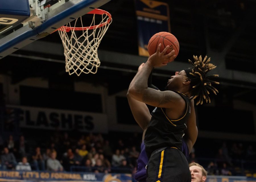Kent State redshirt sophomore VonCameron Davis leaps into a shot at the basket during the game against Portland University on Nov. 14, 2022.