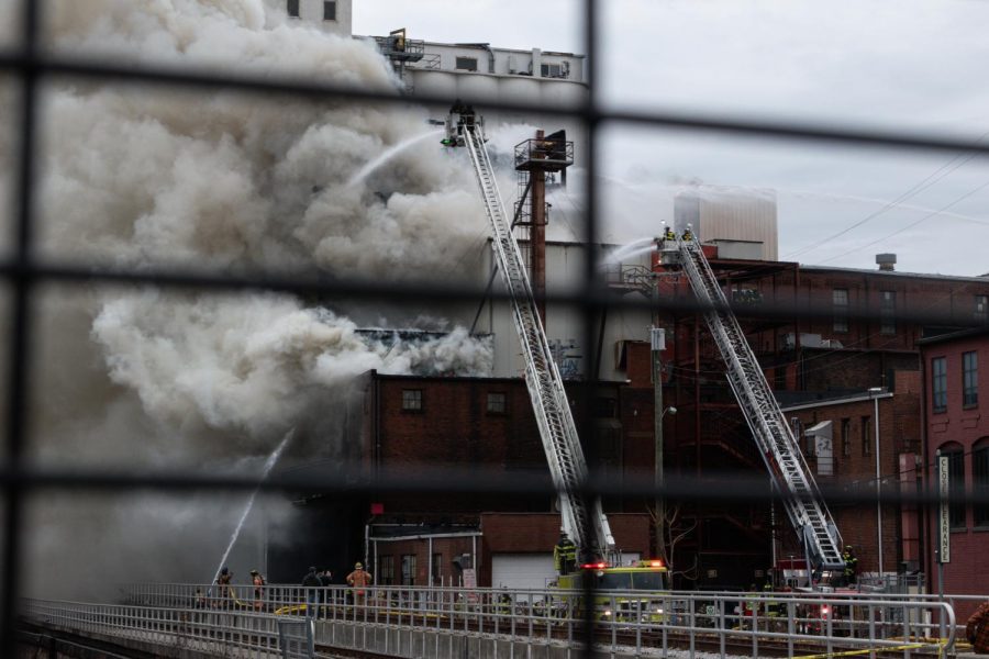 Smoke billows from the Star of the West Mill as firefighters work to put out the blaze.