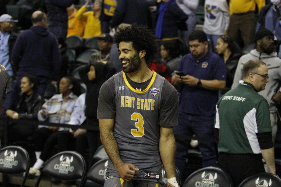 Guard Sincere Carry celebrates Kent States 67-58 win over Cleveland State on Saturday afternoon.
