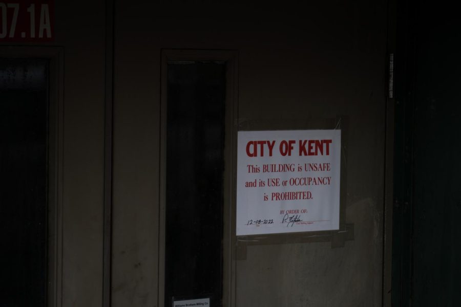 A sign, attached to the front doors, says that use of the building is prohibited on Jan. 17, 2023.