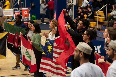 During the half-time of the Kent State mens basketball game against Central Michigan University, Kent State international students took to the court with flags of their home nations on Jan. 31, 2023. 
