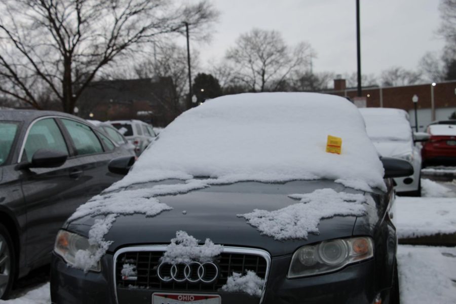 Kent State parking services staying on top of their job by still providing tickets, even through inches of snow.