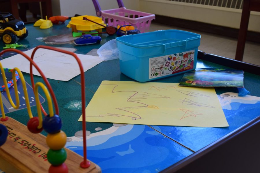 Toys, games and crafts are left out on the sixth floor of the library for kids to play with while their parents study.