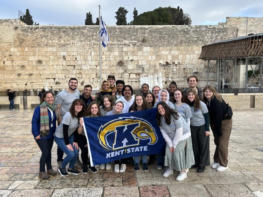 Kent State students hold a flag in Israel during the Leadership trip. The trip was Jan. 3 to Jan. 13.